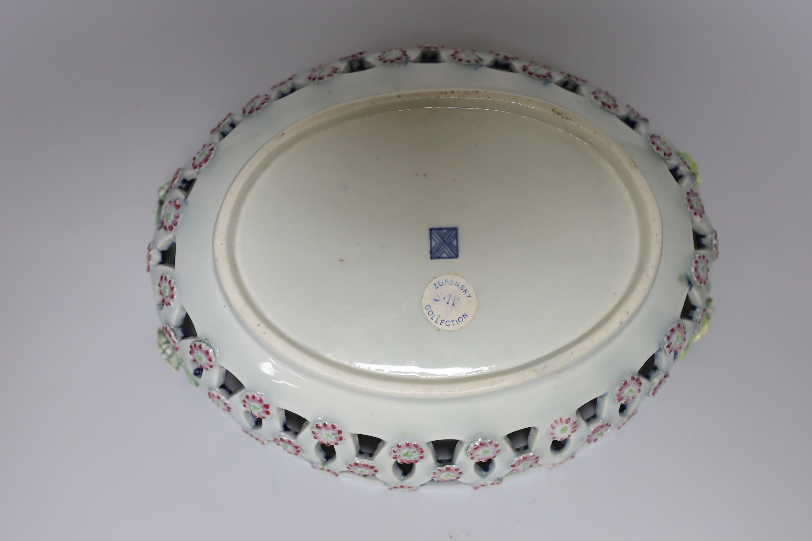 A Worcester two handled basket with pierced sides painted with flowers, surrounded by rich and elaborate gilding c.1770. 25cm wide Provenance: Zorensky Collection, Bonhams 22 February 2006, Lot 157